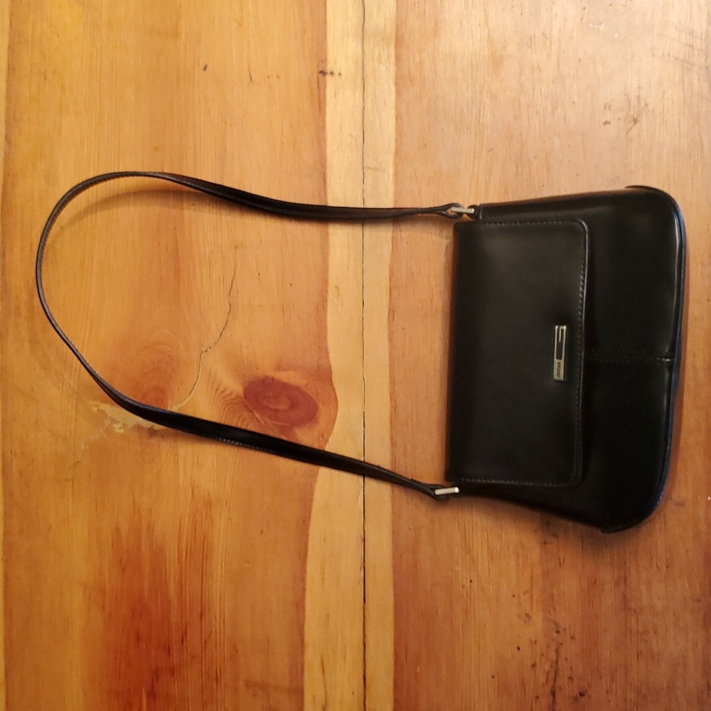 GUESS mini patent leather purse. Never used. Clean inside
